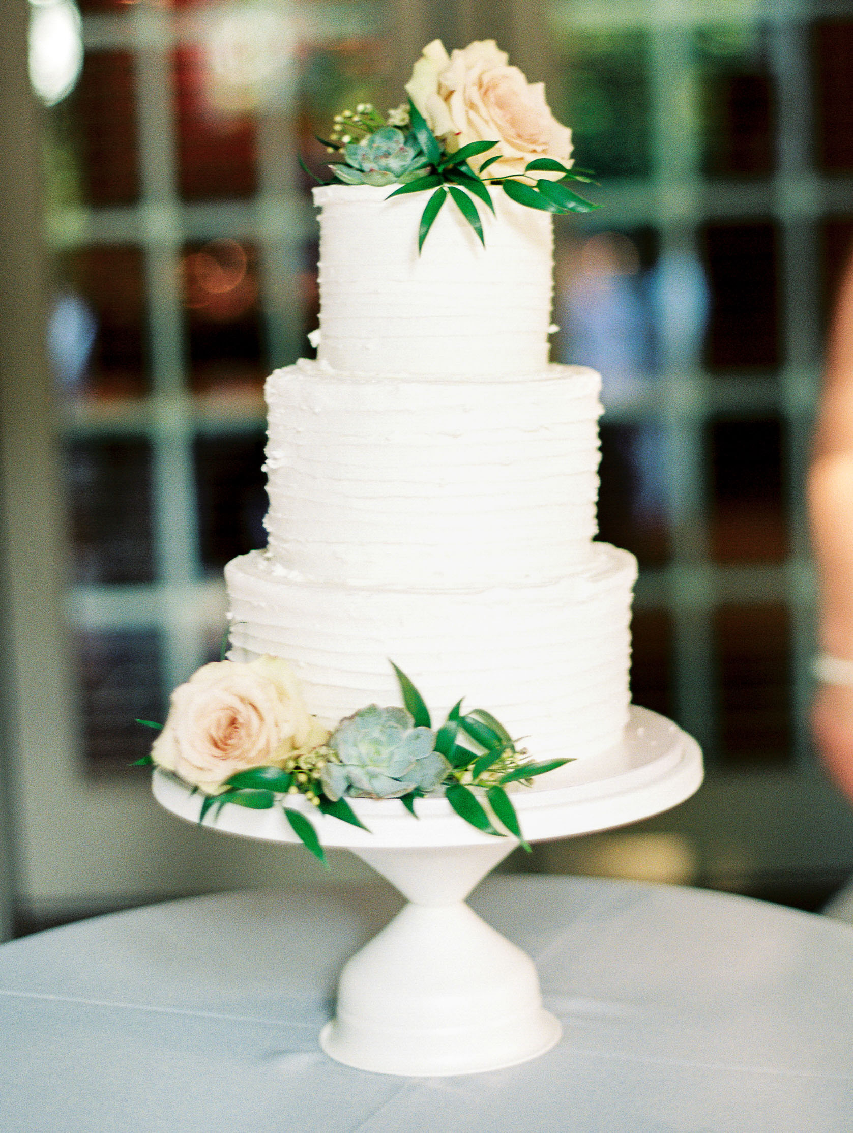 Buttercream Wedding Cake with Succulents and Pink Florals