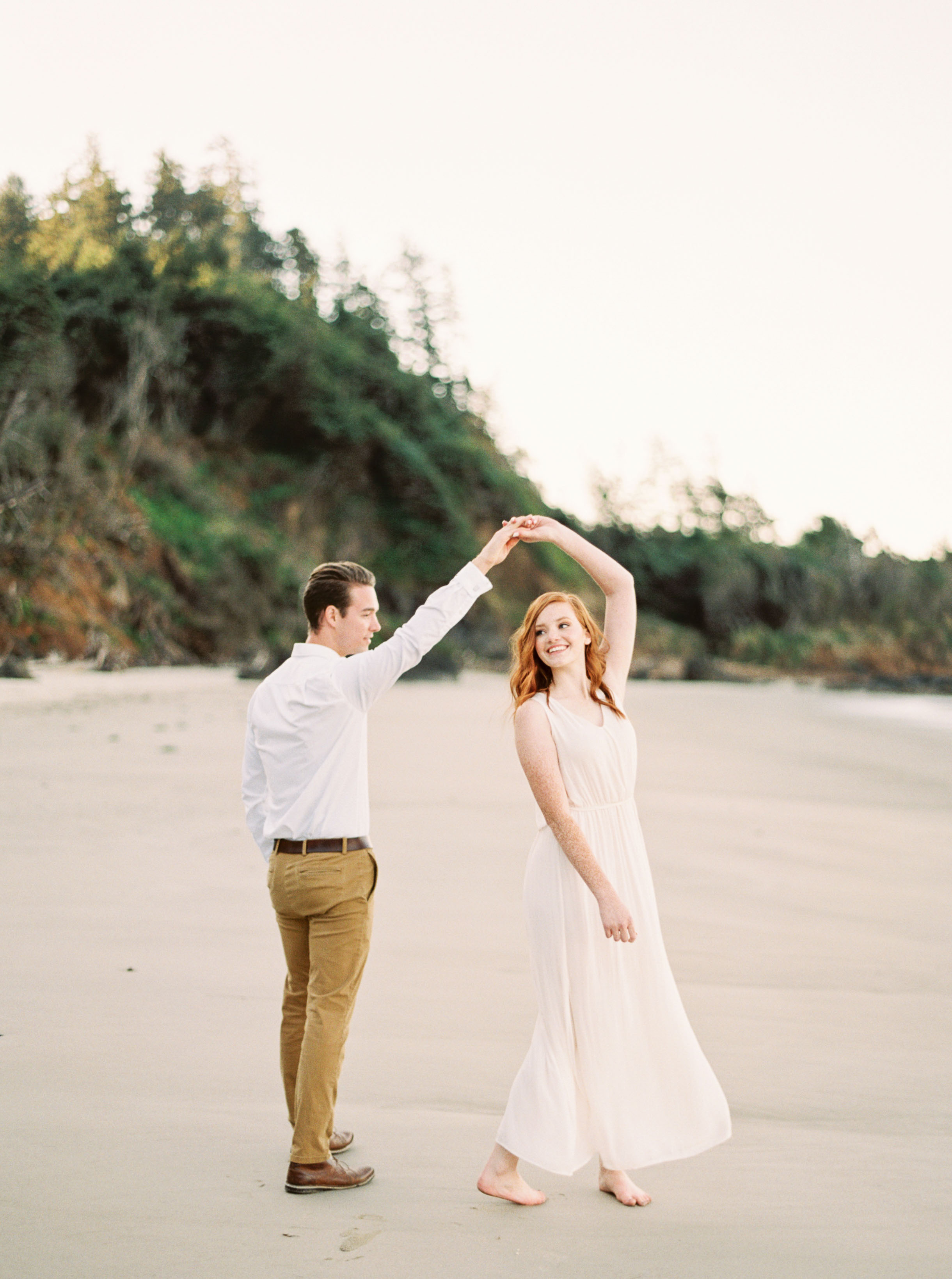Happy Couple Dancing on Oregon Coast Beach